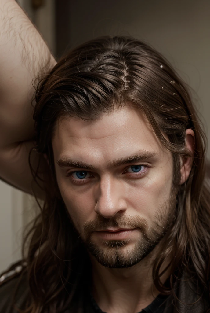 Beautiful muscle god blue eyes beard long curly hair in the ice