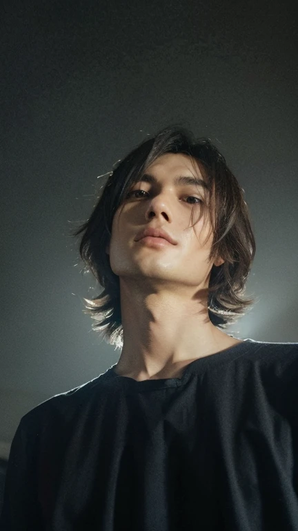 A boy, Wearing a white t-shirt, his hair is black and yellow, his skin is white.