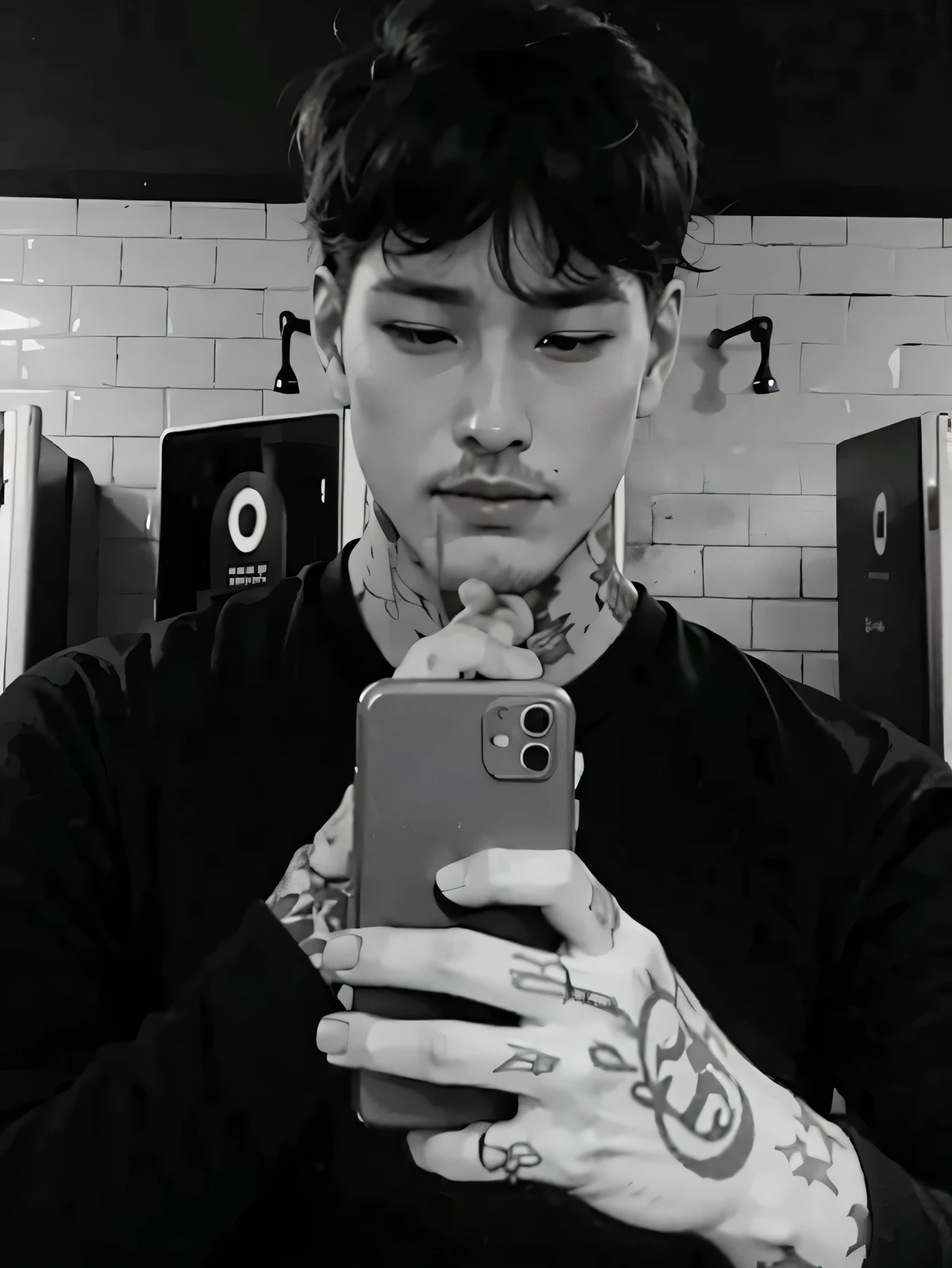 Asian boy in a dark room