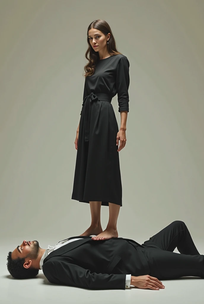 Sahilfe Navy blue headscarf, Black long coat, barefoot, Sexy skinny woman. Man lying in front of woman. Woman puts her foot on the front of man's sweatpants.