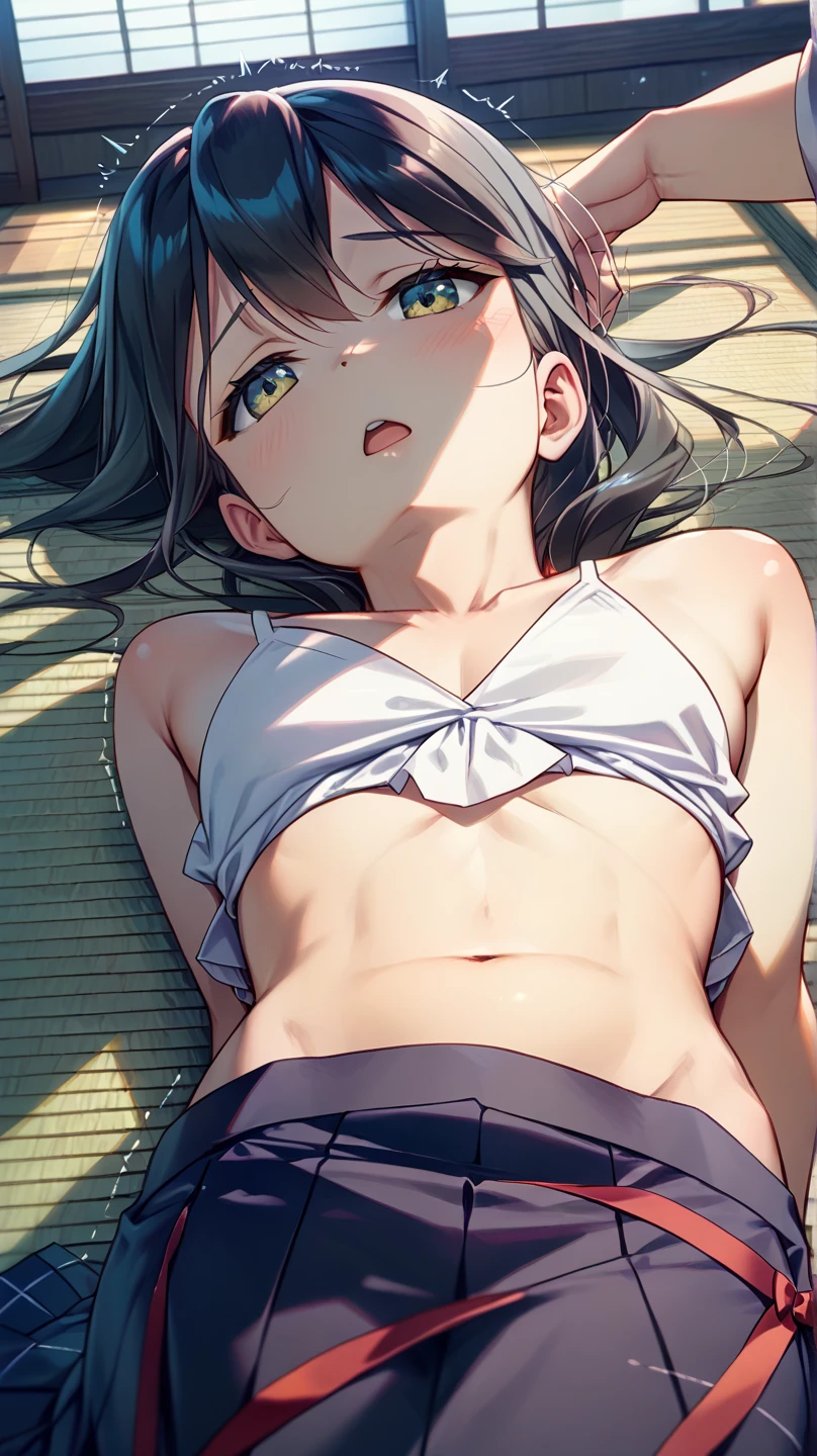 A girl is lying on her back with her eyes closed