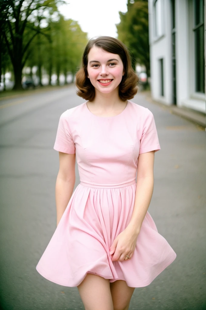 Beautiful, smiling french 17 year old in a very short pink summer dress at Glastonbury, earing trainers,full length