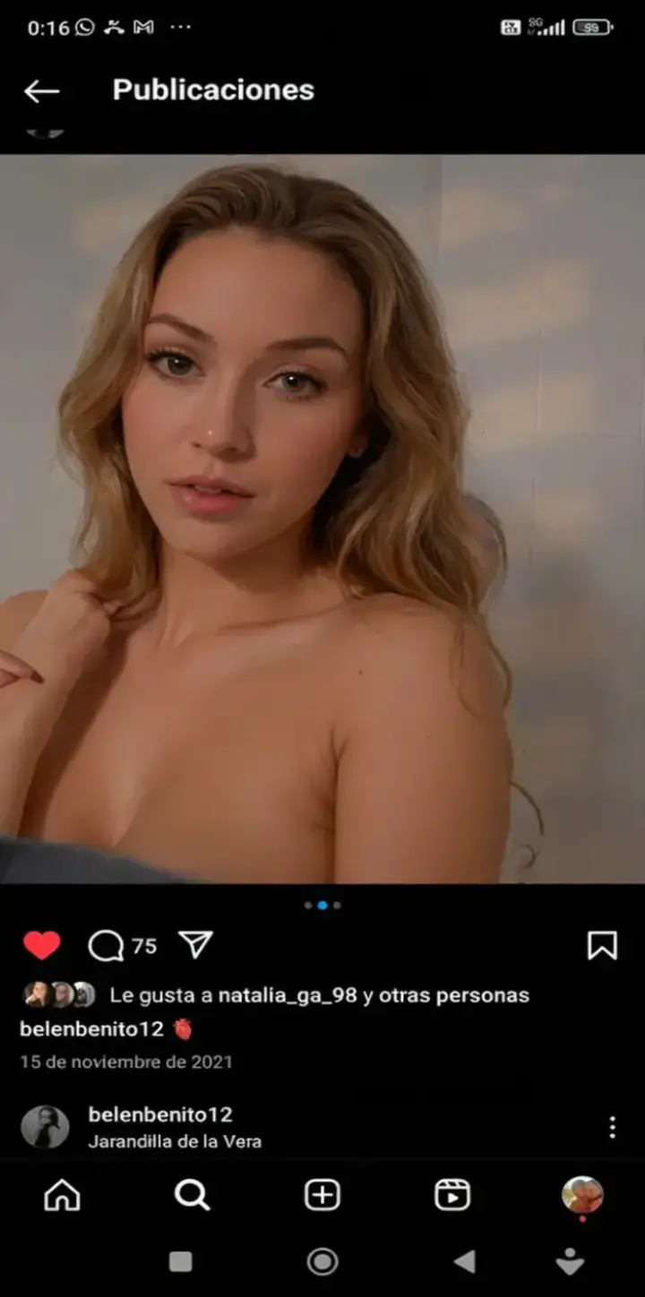 Emilia Clarke with dyed blonde hair taking a selfie photo naked and smiling