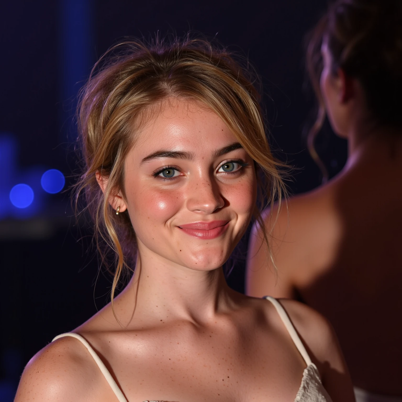 Kiernan Shipka wearing a long dress with a v-neckline and smiling