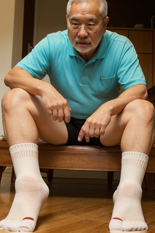 a man taking his socks off his feet 