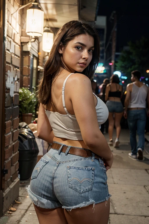 noir, night, road, shops lit up with advertisements on the sides, young girl smiling with fluffy hair and sexy ass in jeans