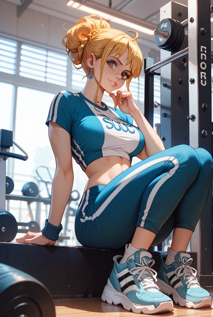 Beautiful and blond, sitting in the gym