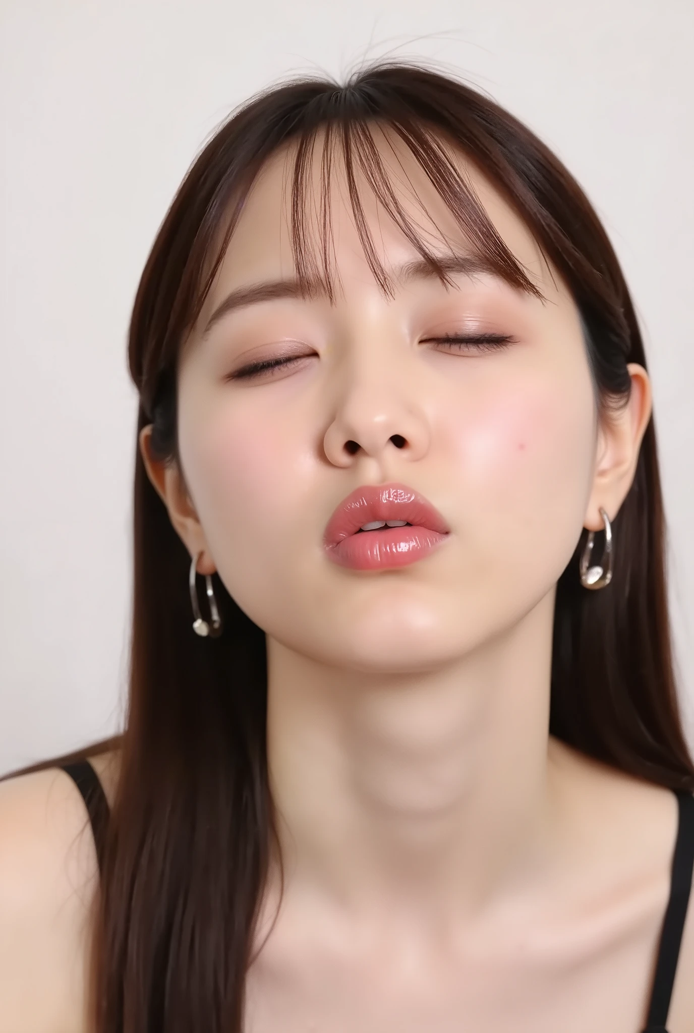 ultra-detailed close-up of a beautiful girl, collarbone-up composition, white studio background, soft natural lighting, slightly elevated camera angle (around 35 degrees), full face and head visible in frame, chin slightly raised, eyes gently closed, deeply affectionate smile, cheeks and ears flushed, dreamy, blissful, euphoric expression, mouth puckered and protruding with a rounded kiss shape, glossy moist lips with shimmering highlights, soft lips reflecting light, extreme focus on lips, inviting kiss pose, longing expression, desperate affection, dere-dere mood, hands behind her back and not visible, natural skin texture with visible peach fuzz, matte facial skin, black camisole strap visible, soft head tilt, bokeh background and soft facial contour blur to emphasize lips, overflowing with affection and dazed joy