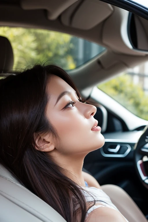 A man and a woman kissing in a car