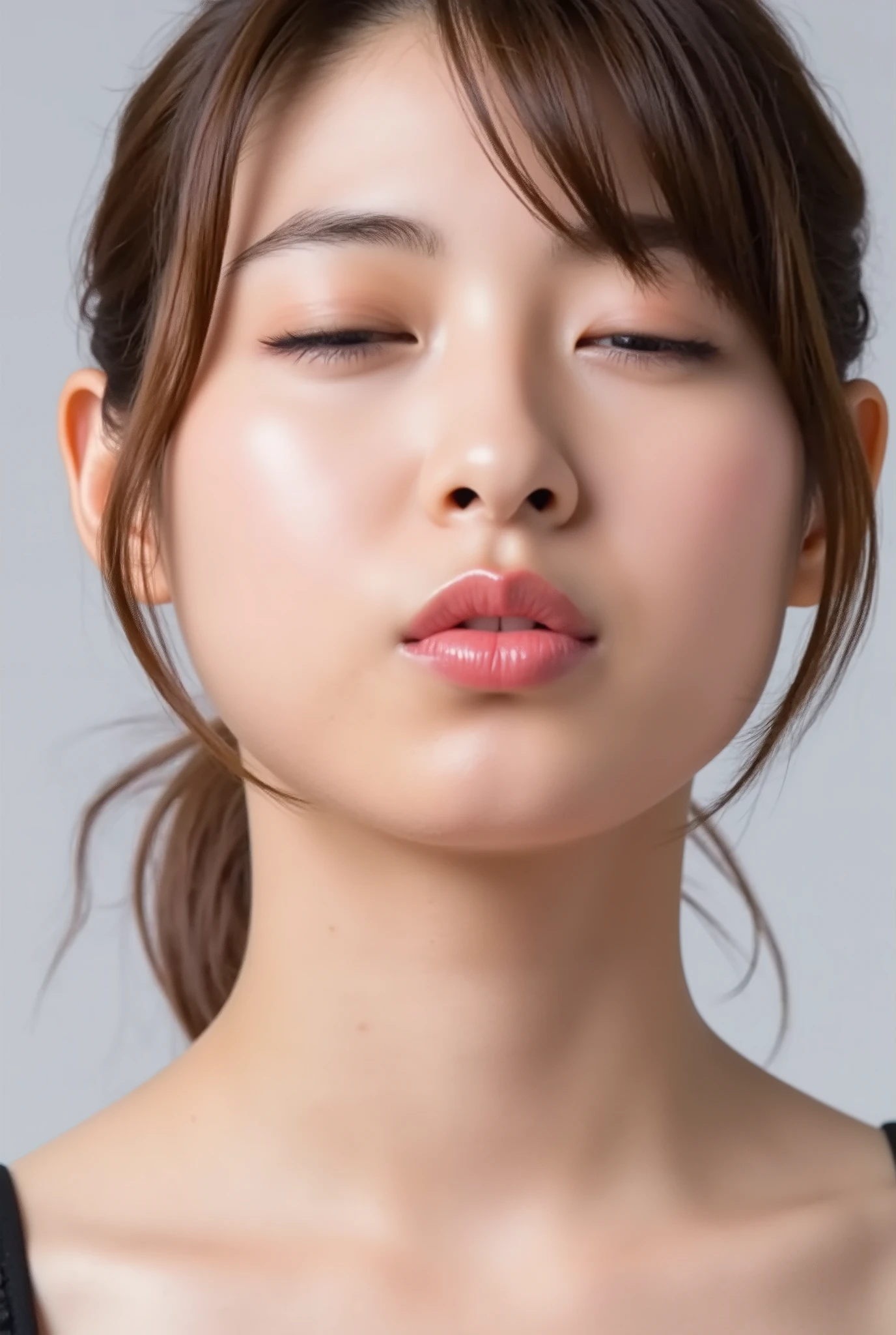 ultra-detailed close-up of a beautiful girl, collarbone-up composition, white studio background, soft natural lighting, slightly elevated camera angle (around 35 degrees), full face and head visible in frame, chin slightly raised, eyes gently closed, deeply affectionate smile, cheeks and ears flushed, dreamy, blissful, euphoric expression, mouth puckered and protruding with a rounded kiss shape, glossy moist lips with shimmering highlights, soft lips reflecting light, extreme focus on lips, inviting kiss pose, longing expression, desperate affection, dere-dere mood, hands behind her back and not visible, natural skin texture with visible peach fuzz, matte facial skin, black camisole strap visible, soft head tilt, bokeh background and soft facial contour blur to emphasize lips, overflowing with affection and dazed joy