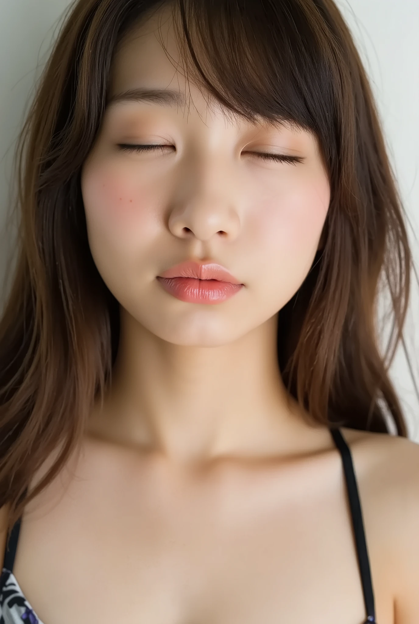 ultra-detailed close-up of a beautiful girl, collarbone-up composition, white studio background, soft natural lighting, slightly elevated camera angle (around 35 degrees), full face and head visible in frame, chin slightly raised, eyes gently closed, deeply affectionate smile, cheeks and ears flushed, dreamy, blissful, euphoric expression, mouth puckered and protruding with a rounded kiss shape, glossy moist lips with shimmering highlights, soft lips reflecting light, extreme focus on lips, inviting kiss pose, longing expression, desperate affection, dere-dere mood, hands behind her back and not visible, natural skin texture with visible peach fuzz, matte facial skin, black camisole strap visible, soft head tilt, bokeh background and soft facial contour blur to emphasize lips, overflowing with affection and dazed joy
