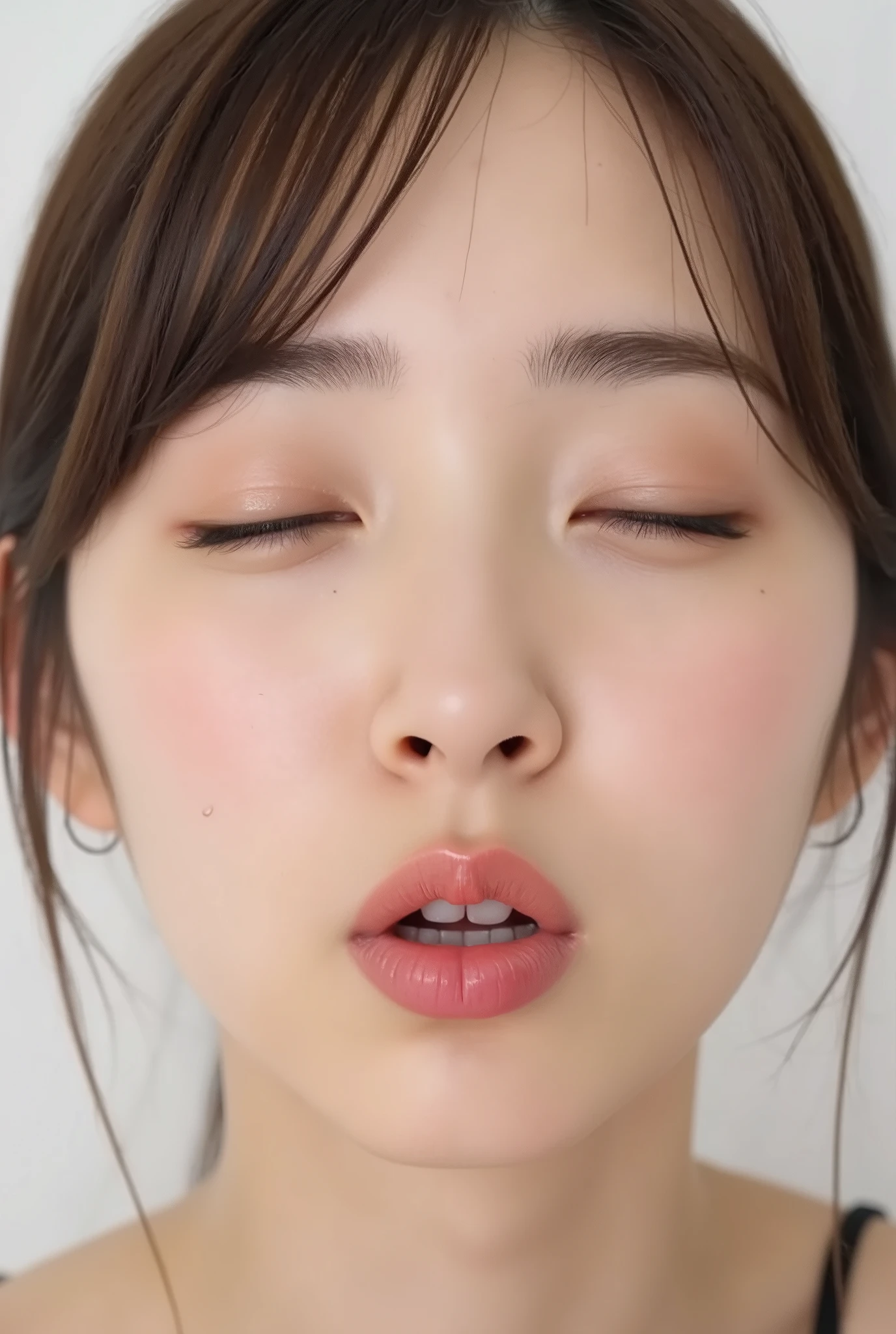 ultra-detailed hyper-realistic close-up of a stunningly cute girl, collarbone-up composition, white studio background, soft natural lighting, soft front-facing posture, head and body facing forward, chin raised slightly higher as if reaching for a kiss, head subtly tilted, black camisole strap visible, natural skin texture with visible peach fuzz, matte skin finish, hands behind her back and not visible

eyes gently closed, cheeks and ears flushed, soft affectionate and dere-dere expression, subtle closed-mouth smile without raised lip corners

lips tightly puckered and protruding upward and forward, forming a rounded vertical O-shape, strong gloss and shimmer, extremely moist and reflective, high contrast lip highlights, lips at the focal point with gentle facial blur, longing kissy face, overflowing with affection and warmth, inviting expression

photographed from a slightly elevated angle (~35-45 degrees above), showing entire face and head within the frame
