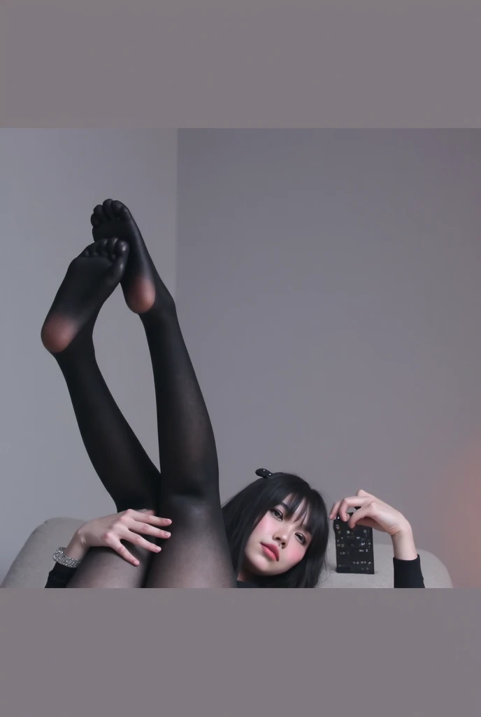 Asian Woman in nylons. She isn’t wearing shoes