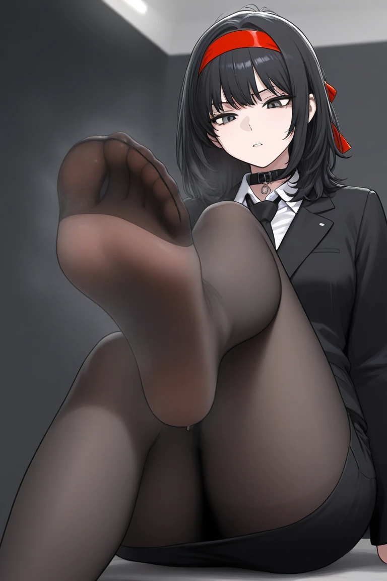A woman in black tights inserting a penis