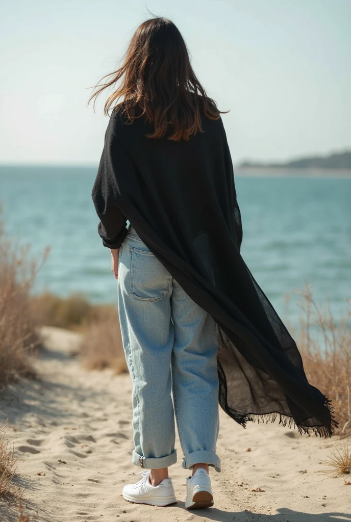 Black headscarf on the beach, black trench coat , white long sleeve t shirt, barefoot, sexy and skinny woman. Man lying on his stomach in front of woman. Woman puts her foot on the front of man's sweatpants.