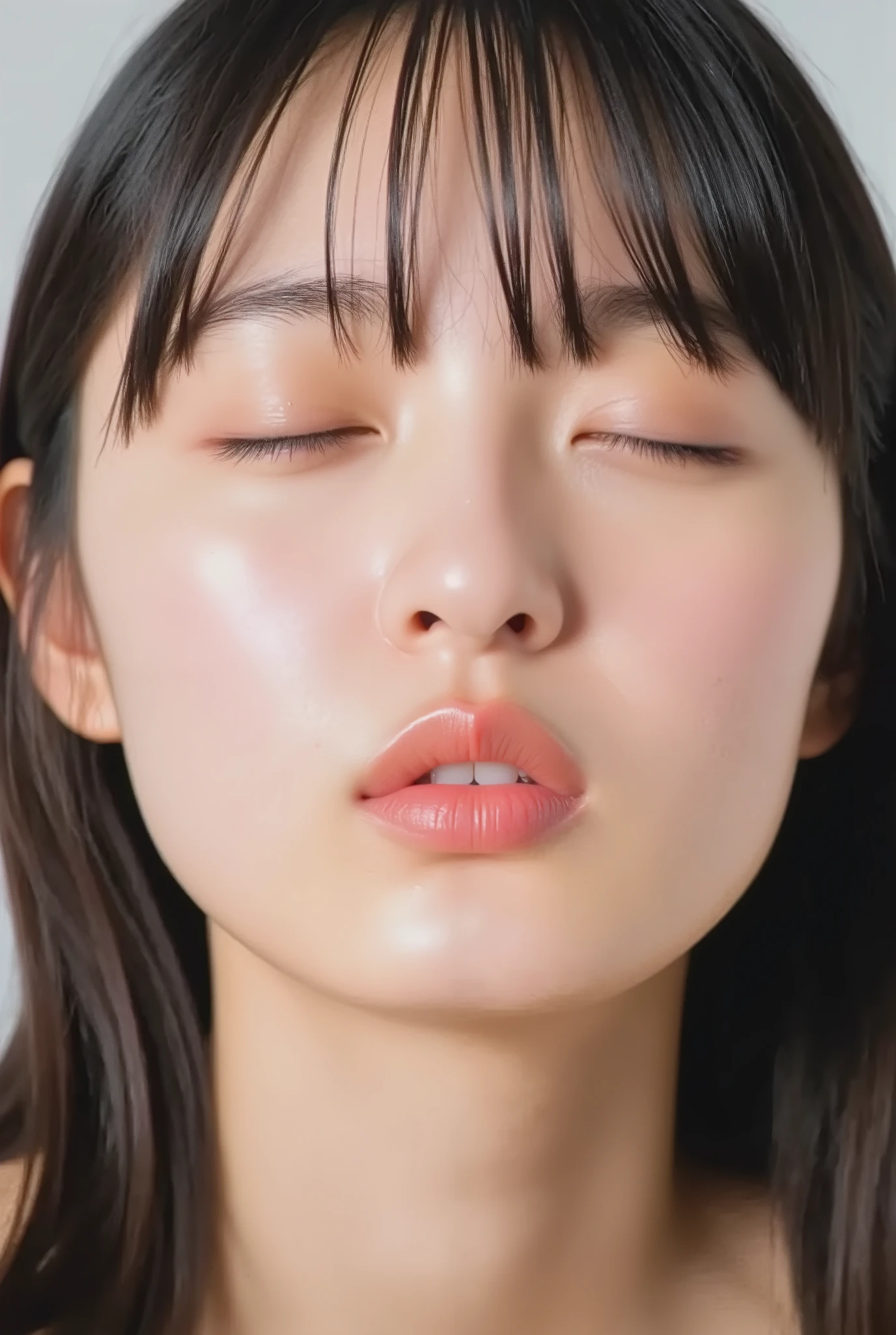 ultra-detailed close-up of a beautiful girl, collarbone-up composition, white studio background, soft natural lighting, slightly elevated front camera angle (around 35-60 degrees), full face and head visible in frame, chin gently lifted as if reaching up, head slightly tilted for cuteness, hands behind back and not visible, black camisole strap visible, soft innocent charm, longing and dere-dere expression, blissful and euphoric smile with flushed cheeks and ears, dreamy and adorable aura, eyes gently closed or nearly closed with soft lashes, expression overflowing with affection and dazed joy
extremely puckered lips forming a tight rounded "O" shape, strongly pursed lips protruding forward, circular and centered kiss-mouth, shimmering glossy lips with wet highlights, lips reflecting light with moist texture, hyperfocus on lips with soft depth-of-field blur around face contour to draw attention, slightly parted mouth (optional) to hint at tongue, but lips retain the tight circular shape
realistic natural skin texture with visible peach fuzz and matte softness, no visible makeup, subtle facial pores and skin microdetails, romantic soft glow
intense feeling of affectionate anticipation, cute and bashful yet deeply inviting kiss pose, soft warm atmosphere