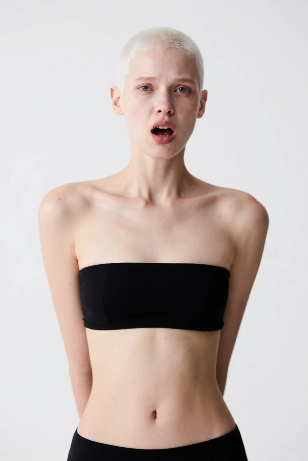 a photo of a seductive woman, (she is wearing (egirl:1.3) makeup and a choker necklace:1.2), mascara, , (textured skin, skin pores:1.1), (moles:0.8), imperfect skin, goosebumps, flawless face, (light freckles:0.9), ((photorealistic):1.1), (raw, 8k:1.2), dark, muted colors, slate atmosphere, (full body is in frame:1.5)(NSFW:1.5)(blonde hair)(slim body)(naked nude:1.5)