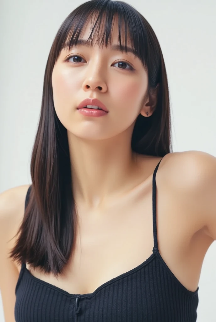 A Japanese woman with long black hair wearing a swimsuit with her upper body removed.　C cup