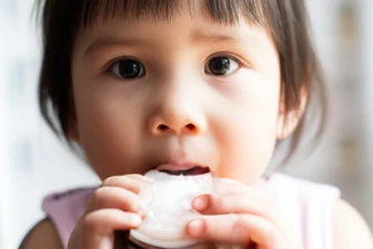 Baby arafed in a car seat drinking from a bottle, soy milk, soy milk, sea of milk, milk, with a straw, innocent face, marks on your face, ready to eat, dripping milk, flowing milk, sweet and innocent, close-up photo, drinking silly tea, having a snack, shot in the face, alexa grace, blue eyes