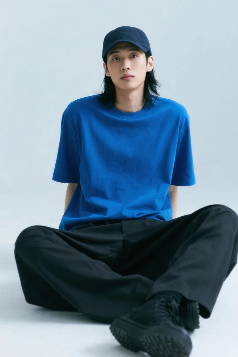 14 years,Boy, black hair, black eyes, blue high-neck blouse, white Men's shorts, Ninja band on forehead