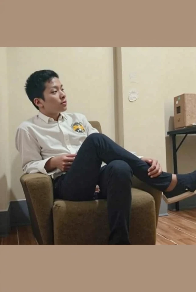 a boy sitting on a chair