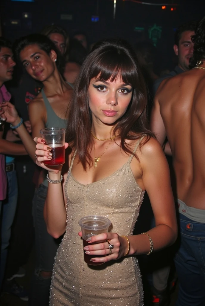 A beautiful woman with brown hair with bangs in an attractive outfit at a party with an iPhone in her hand and an attractive look