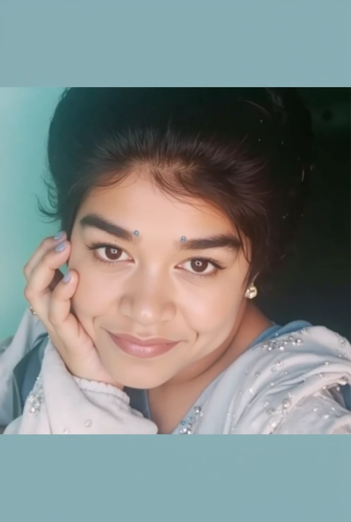 1 cute confident young indian girl taking a closeup selfie holding a blank right under her face, candid photo, height 160 centimetres, petite build, fair skin, average hair length of 60 centimetres, photorealistic, detailed eyes, highly detailed, 8k, messy bun hair, naughty smile, wearing a blue top, holding a piece of paper