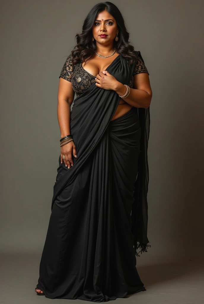 A indian plus size sexy aunty wearing dark grey blouse and dark grey saree , she has big wide belly and fat legs