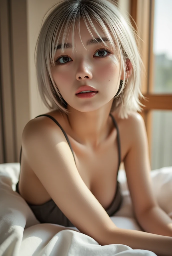 Beautiful 18 year old Asian girl with short white hair, naked sitting lying facing the camera holding, with a seductive face wanting to fuck