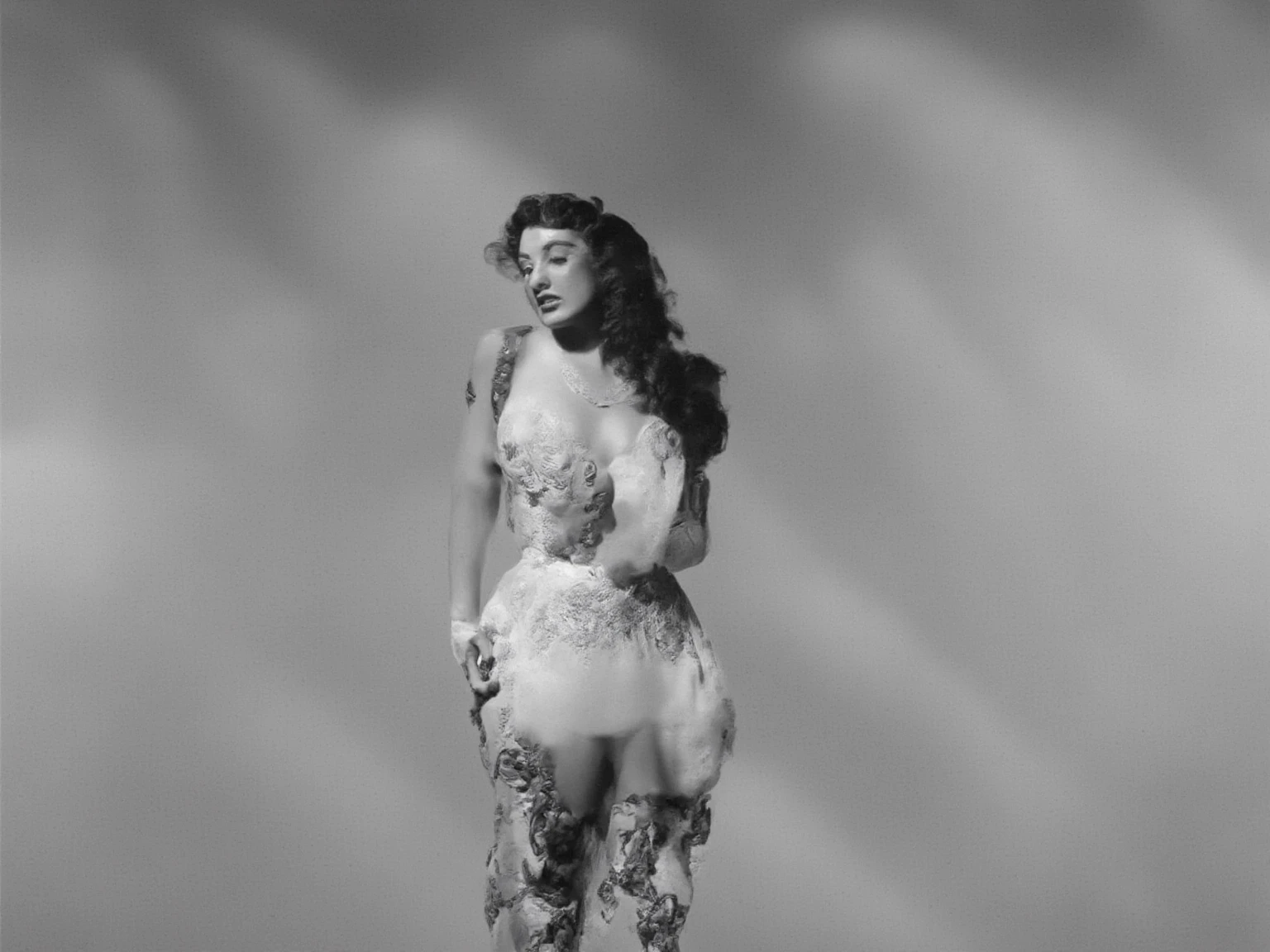 Hedy Lamarr showing her butt completely naked and smiling