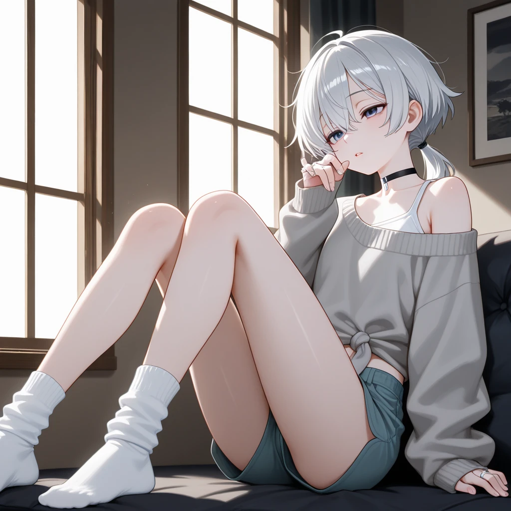 A girl with very visible bright yellow eyes and her hair is white and cut, she is at home wearing a white top and denim shorts