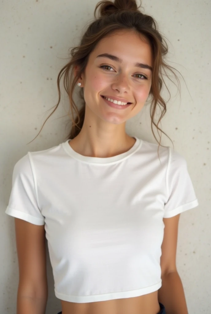 young brazilian woman with tied hair wearing a white cotton round neck t-shirt with her hand on her waist and a subtle background