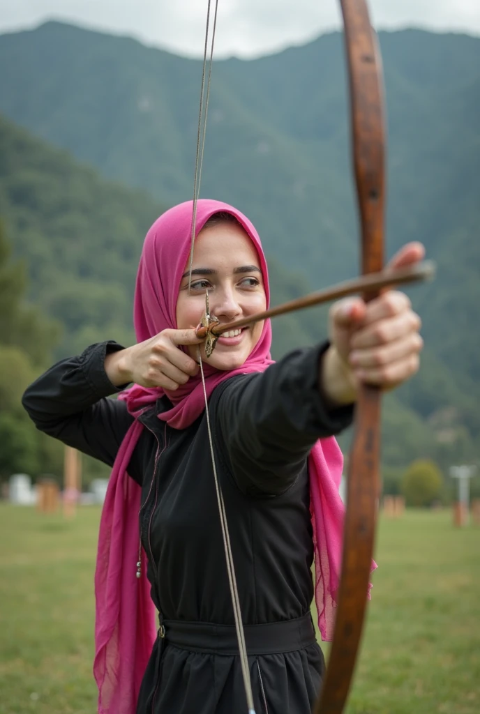 young malay girl, aged 9, wearing hijab, playing archery, using recurve bow with stabilizer, near padi field