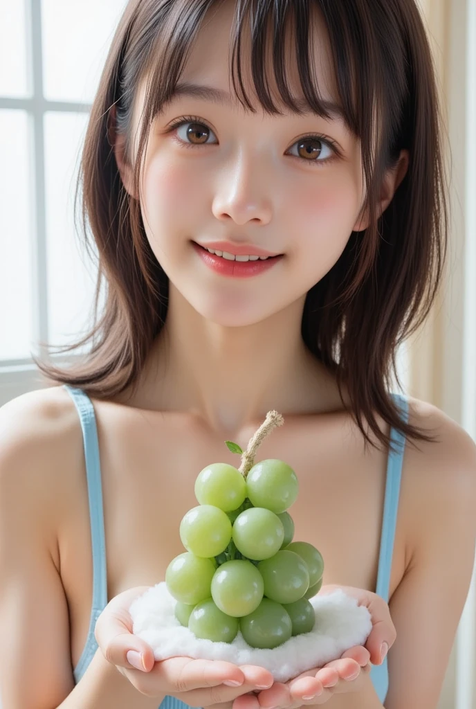 Young cute girl with translucent grapes