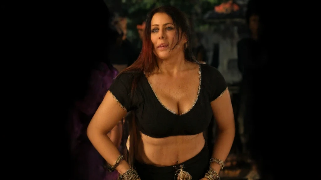 Looks like Nayanthara, milf, cougar lady witch, horny Gothic milf,  50 years old gorgeous mature lady, pervert demoness, demoness of lust, curvy, black lips, horny face, extremely gorgeous, thick figure, heavy physique, voluptuous, curvy, sexy figure, Fashionable portrait of androgynous alien looking witch wearing veil, glowing eyes, futuristic design, minimal details, givenchy, photoreal, 200mm, hd, f/ 2.0, highly detailed, surreal, sexy beautiful evil woman, sexy bold sequin Saree with strapless Bra, chudail, Pishachini, horror genre, blood-thirsty enchantress, powerful female spirit, eerie, drop dead, in the style of red and blue, (intricate details, hyperdetailed:1.15) (skin texture:1.2), dark Moody tone, cinematic lighting, haunted place in background, 
