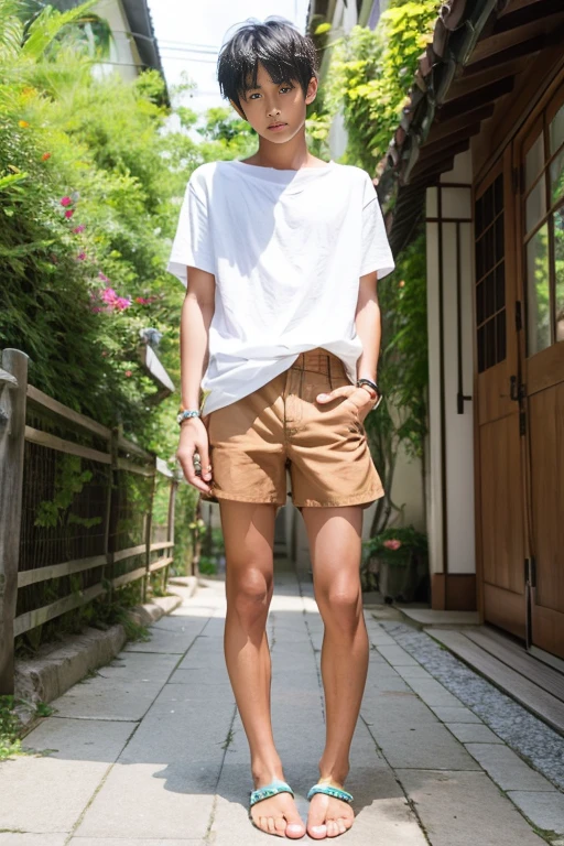 A tanned 12-year-old Japanese boy posing for a full-body photoshoot in shorts during summer vacation