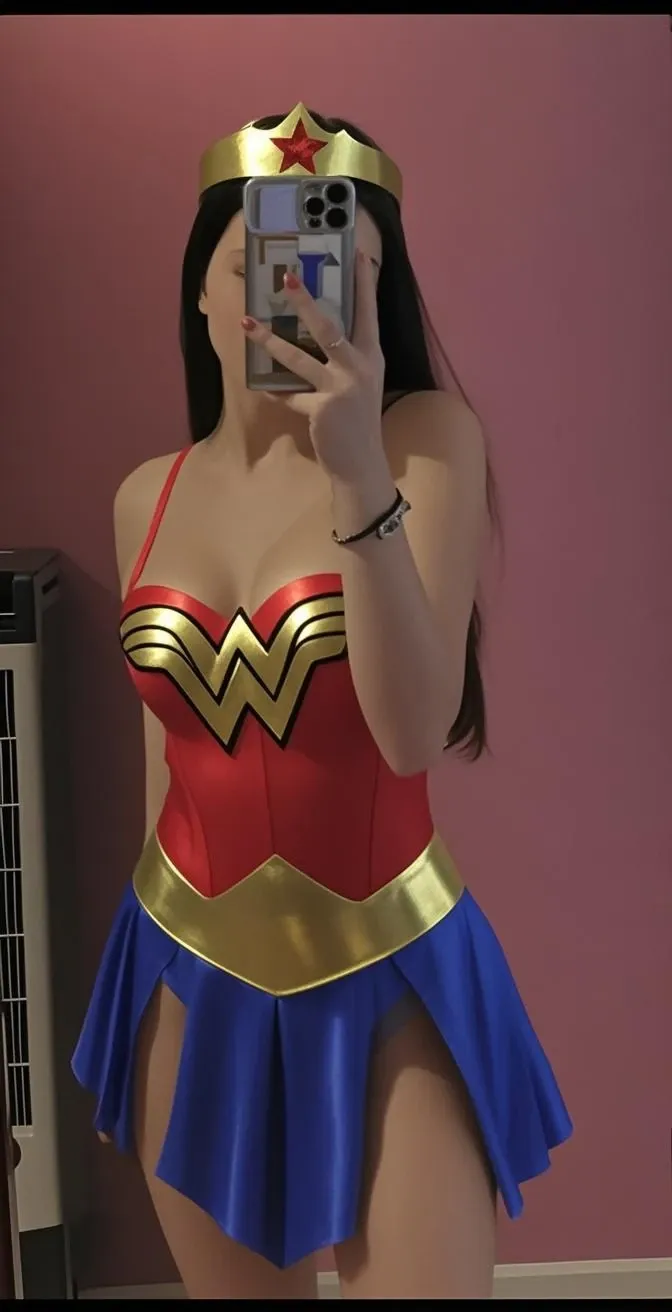 there is a woman in a bathing suit posing for a picture, superhero body, wearing red and yellow hero suit, super-hero girl,  dressed as wonder woman, cute girl wearing wonder woman suit, wonder woman!!, posing like a superhero, pink body, top half of body, wearing leotard, bodybuilder superhero bikini
