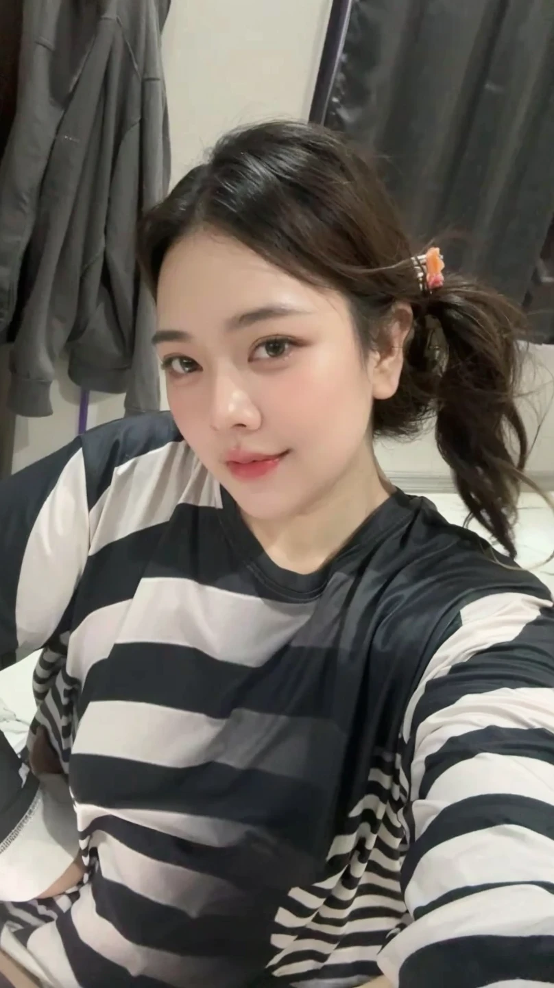 A Korean girl with brown hair.