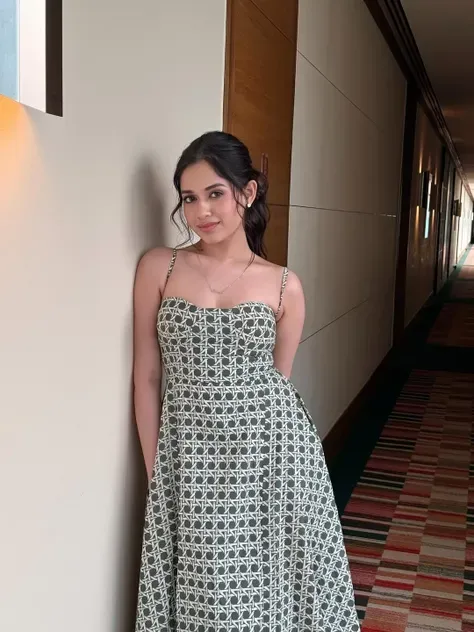 tall fair skinned Pakistani woman in skimpy sleeveless backless deep neck salwar kamiz showing off long shapely legs, prominent collarbone, barefoot, full shot