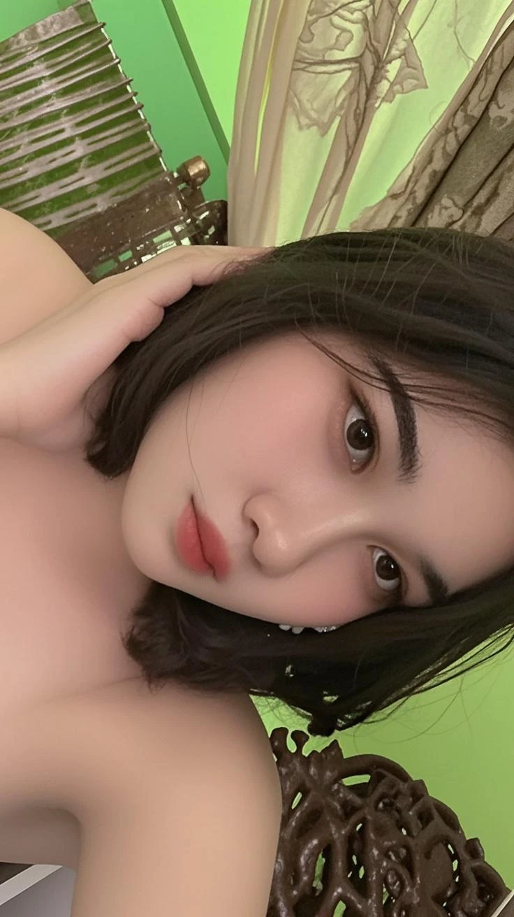 (best quality,highres:1.2),ultra-detailed,realistic:1.37,portrait,woman with beautiful face,detailed eyes and lips,seductive eyes,long straight hair,black brown hair color,blushing intensely,lips parted,ready to kiss,long oversized white shirt,lying on bed,sexy,cute