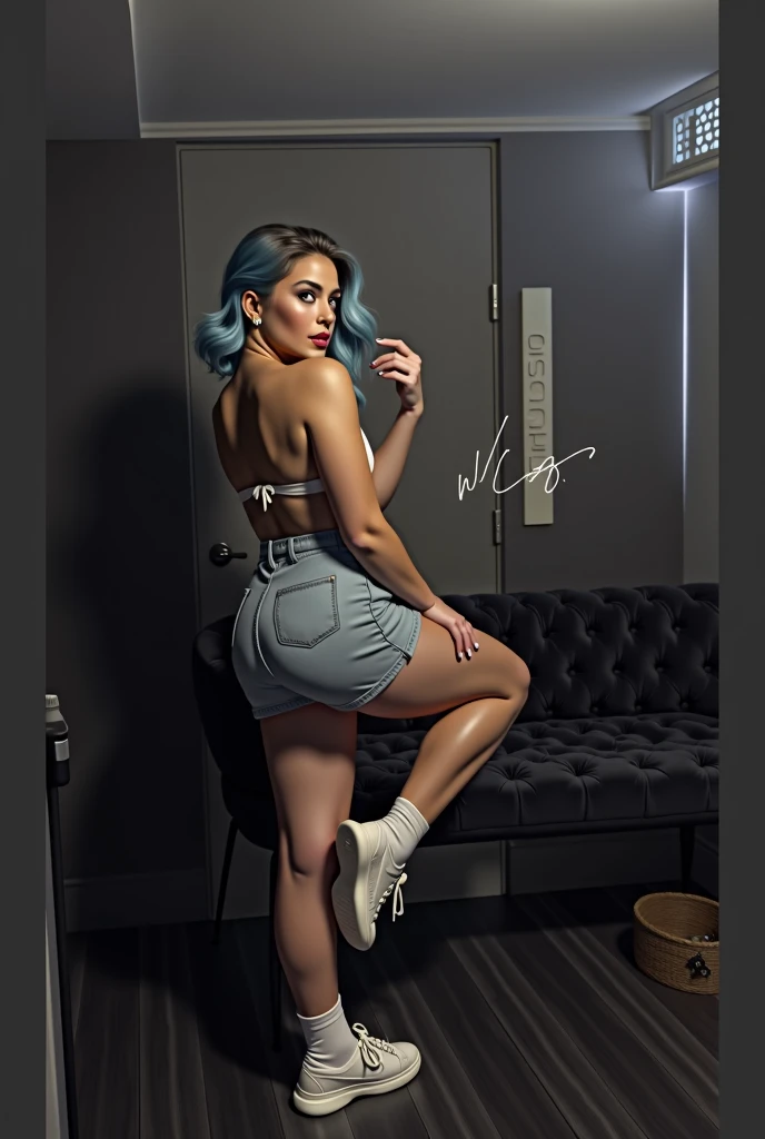 Lady Gaga dressed in a bra and blue pants