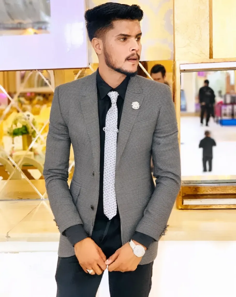 ((cute, wearing a modern luxurious navy blue suit, pocket scarf,, ((gray background, symmetrical facial features)), intricate details, studio lighting, 80mm, portrait, shallow depth of field, CEO, smiling, happy