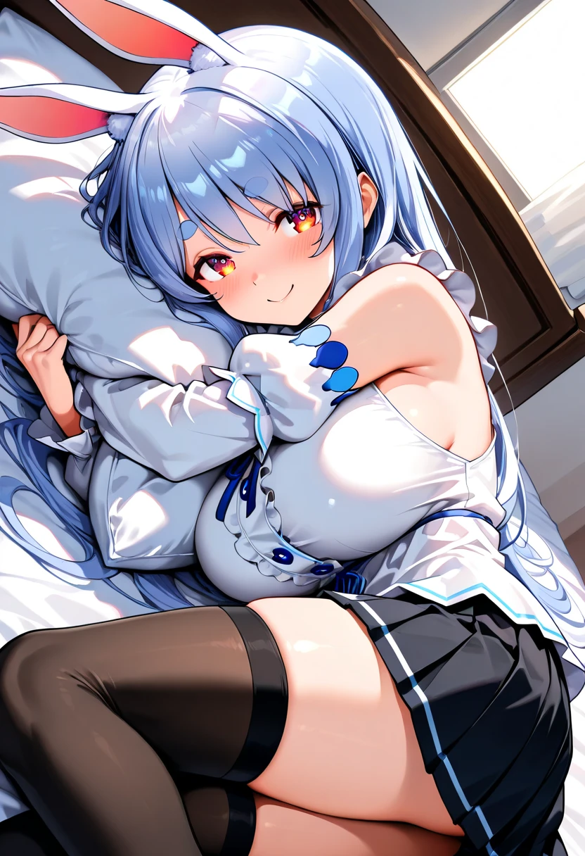 a white blanket with and a bunny stuffing 