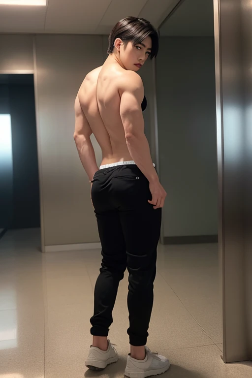 Handsome muscular young teenage boy wearing black micro thong , standing backward, showing his huge muscular butt