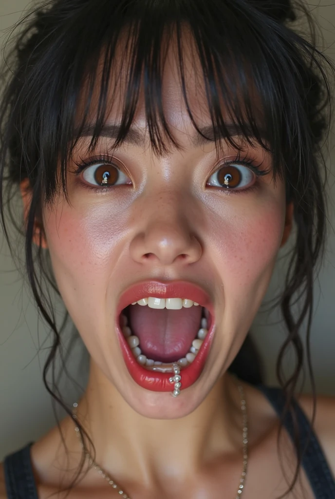 Asian woman with black hair spits out her saliva