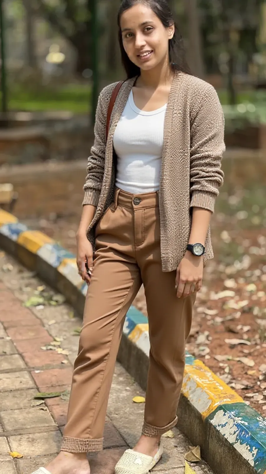 A girl in a garden, (best quality,4k,8k,highres,masterpiece: 1.2), (realistic,photorealistic,photo-realistic: 1.37), (aesthetic: 1.1), beautiful detailed eyes, beautiful detailed lips, Indonesian face: 1.1, long eyelashes, joyful expression, wearing light blue jeans: 1.1 and maroon red t-shirt: 1.1, full body: 1.1, glasses: 1.1, 1 large tote bag: 1.1, standing under natural daylight: 1.1, surrounded by vibrant flowers in a lush garden: 1.1, soft breeze: 1.1, portrait: 1.1, vivid colors: 1.1, subtle color grading: 1.1, soft warm lighting: 1.1, bokeh: 1.1.