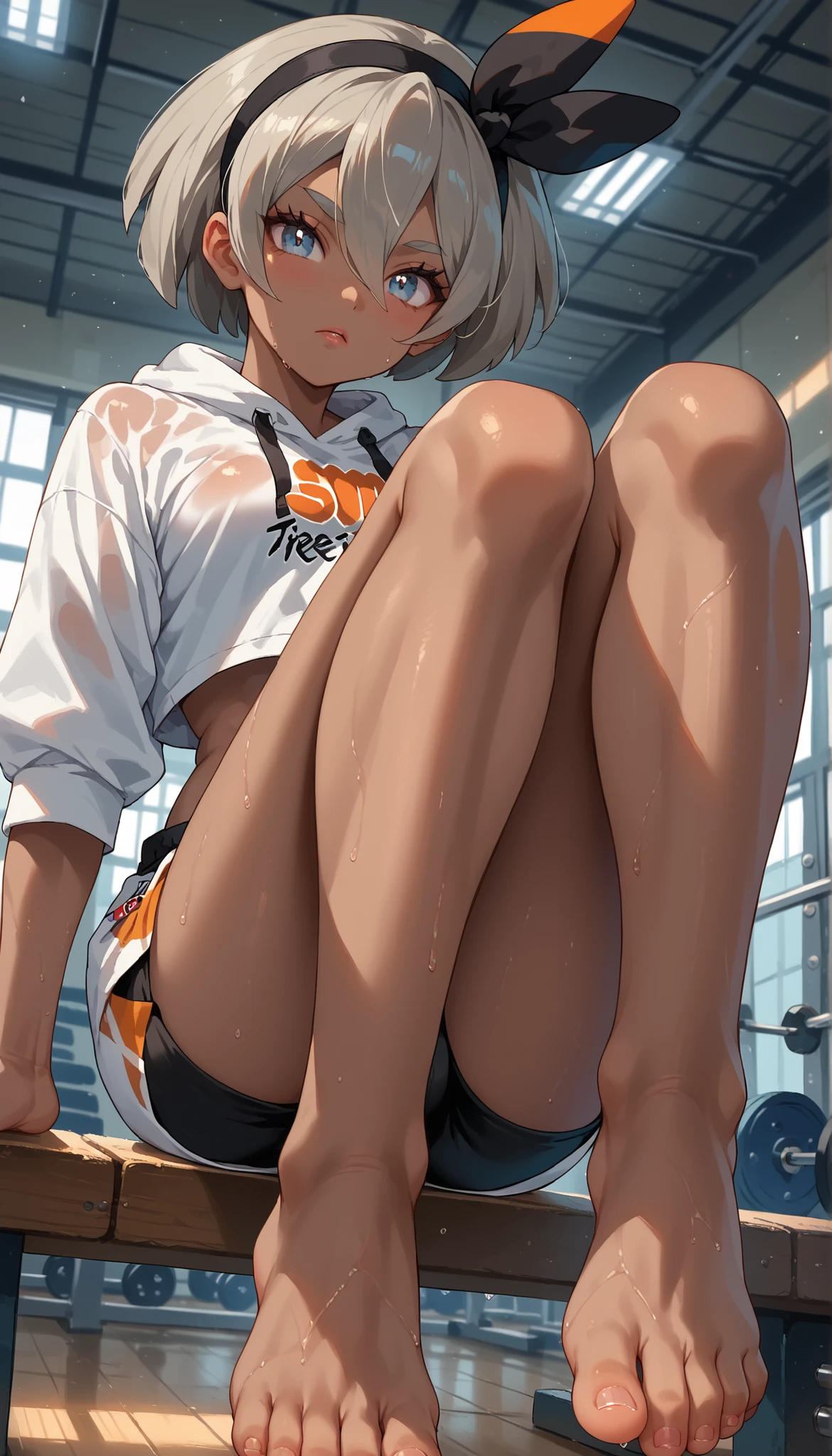 , 1girl, solo, pokemonbea, blue eyes, wide anime eyes, dark skin, dark-skinned female, grey hair, hair between eyes, short hair, ribbon, hair ribbon, hairband, black ribbon, athletic build, small sized breasts, perky breasts, long toned legs, barefoot, wearing a cropped hoodie, gym shorts, sweaty, sitting on bench , dynamic angle, view from below, viewer looking up, dynamic background, gymnasium setting, 8k quality, masterpiece, vivid colours, perfect lighting, perfect shading and shadowing, lifting foot to viewer, foot fetish, perfect feet, perfect soles, perfect toes (5 toes on each foot) extremely low angle
