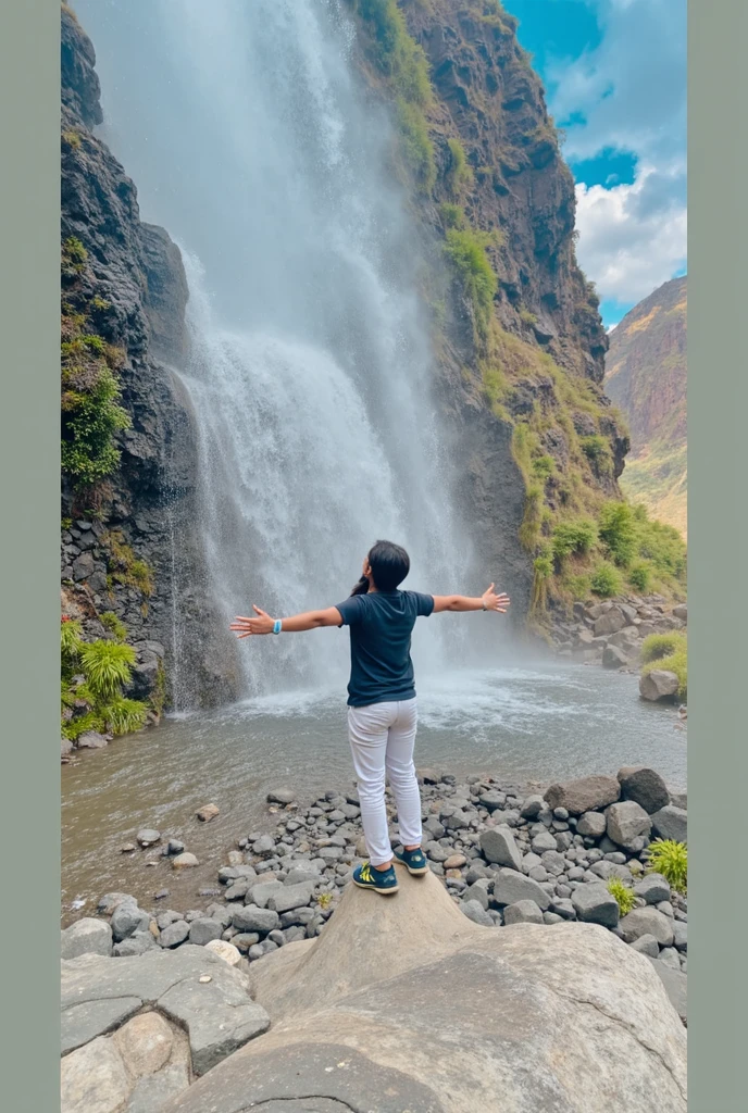 A man the name is Sagar his small sister architha, sister celebrating brother's birthday, the background is in the Nature full of waterfall
