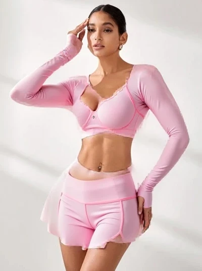 Perrie Edwards wearing sexy pastel tight leggings and smiling