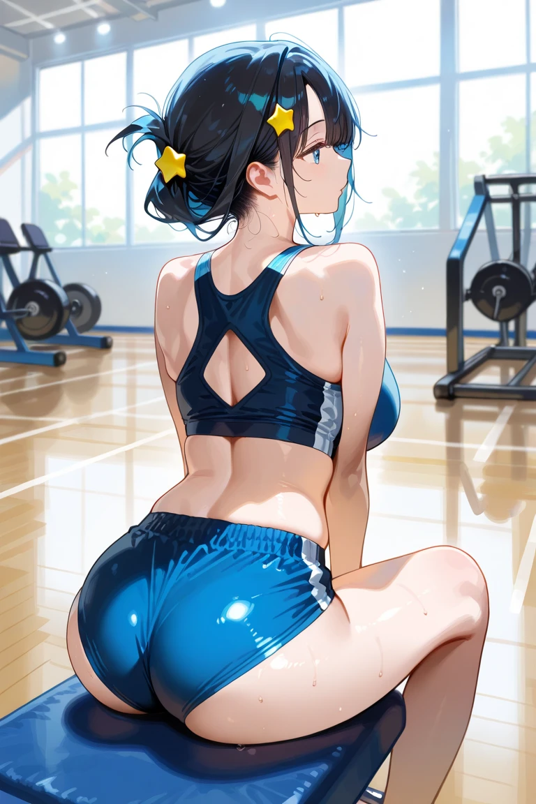 Young woman with tight-fitting swimsuit in a gym, the gym paid off and his chest and legs grew